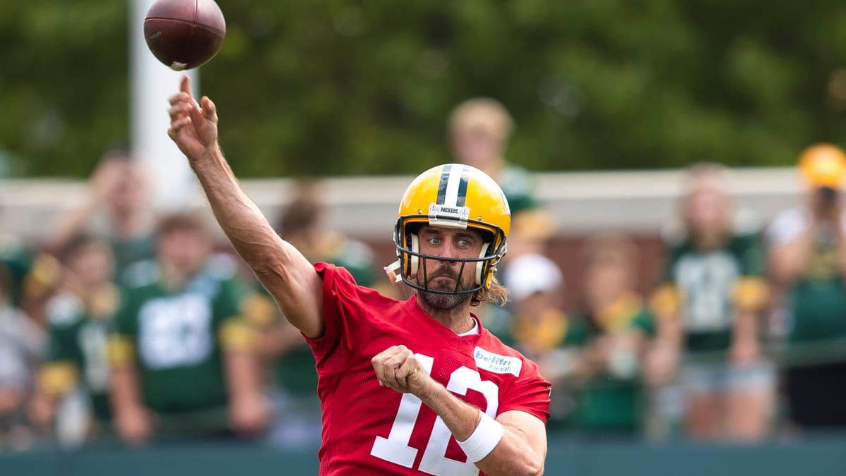 Green Bay Packers cornerback Jaire Alexander (23) breaks up a pass intended  for wide receiver Allen Lazard (13) during an NFL football training camp at  Lambeau Field Saturday, Aug. 7, 2021, in