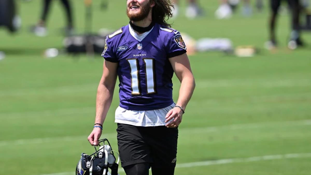 Baltimore Ravens kicker Justin Tucker (9), with Jordan Stout