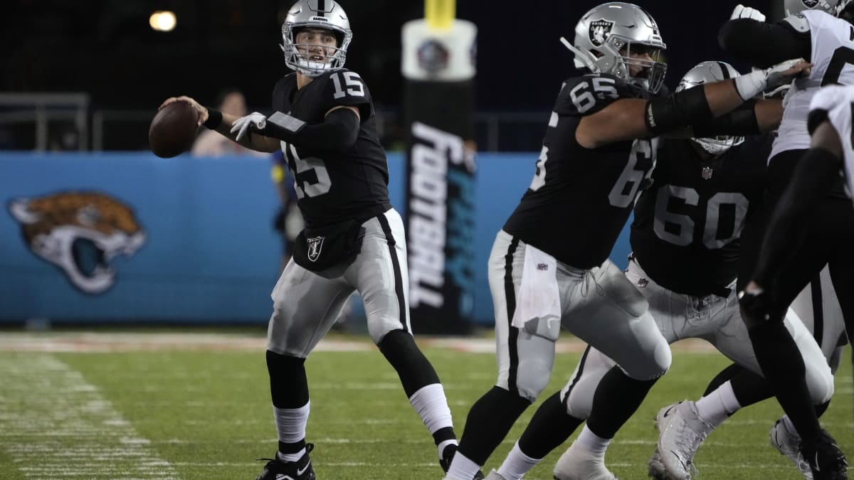 Las Vegas Raiders quarterback Chase Garbers (14) prepares to throw