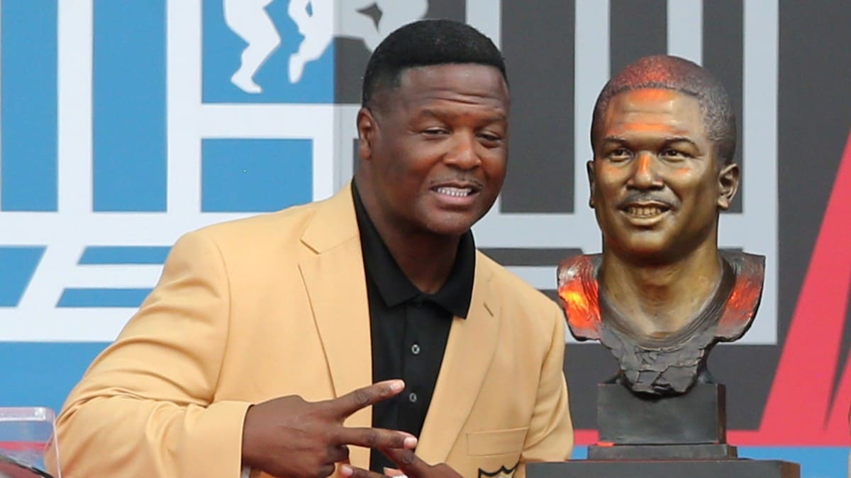 LeRoy Butler poses with Hall of Fame bust