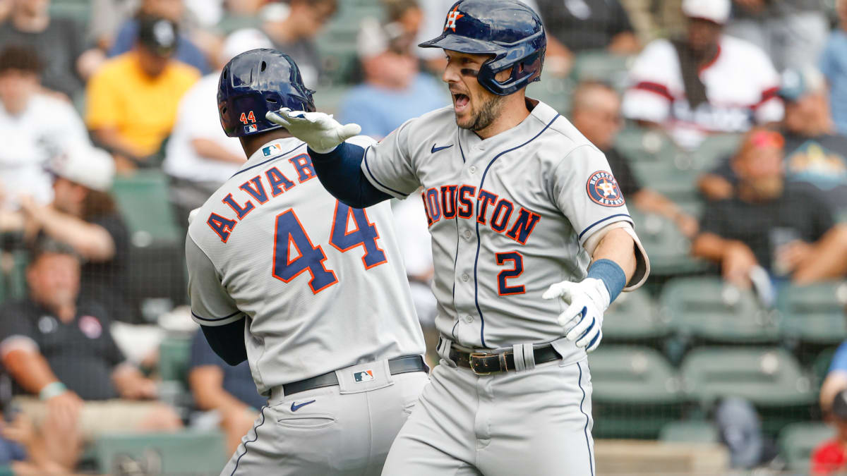 Chicago White Sox shortstop Romy Gonzalez fields a ball hit by Houston  Astros' Alex Bregman and tosses it to second baseman Josh Harrison for the  third out in the top half of