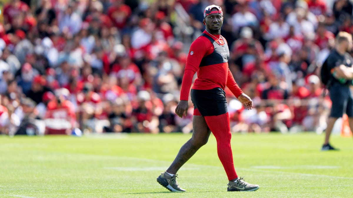 San Francisco 49ers wide receiver Deebo Samuel (19) rides a stationary bike  on the sideline during the second half of an NFL football game against the  New Orleans Saints in Santa Clara