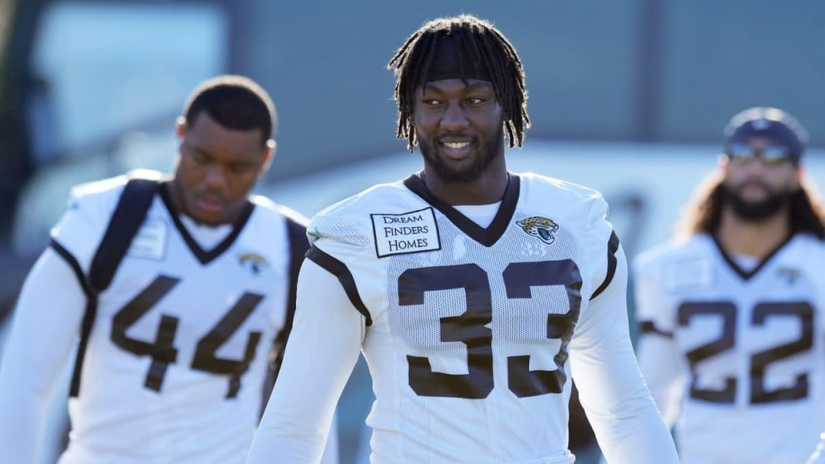 Jacksonville Jaguars linebacker Devin Lloyd (33) enters the field