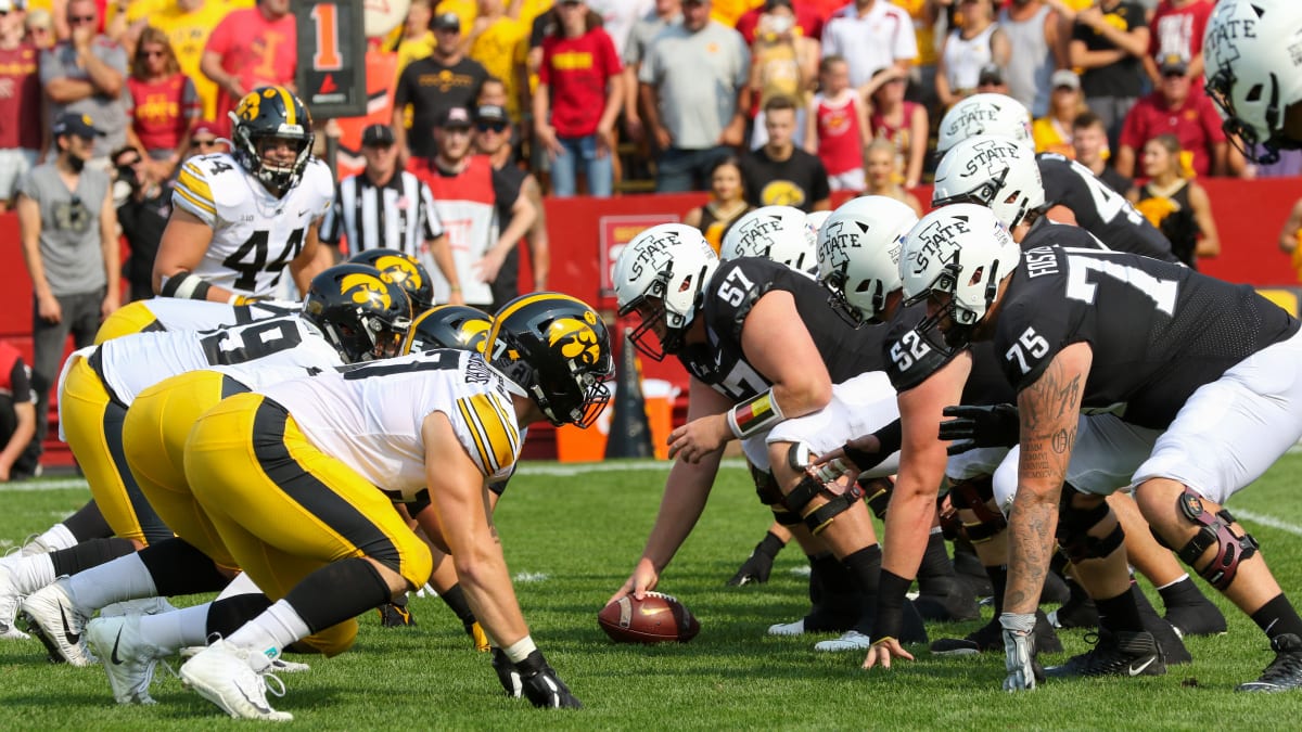 ISU's Brock Purdy wears Iowa Hawkeyes headgear after Cy-Hawk game