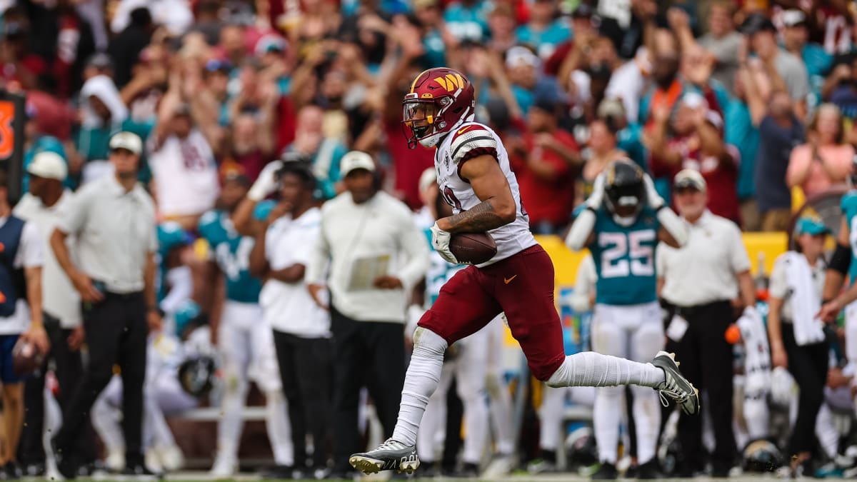 Washington Commanders safety Darrick Forrest (22) runs during an