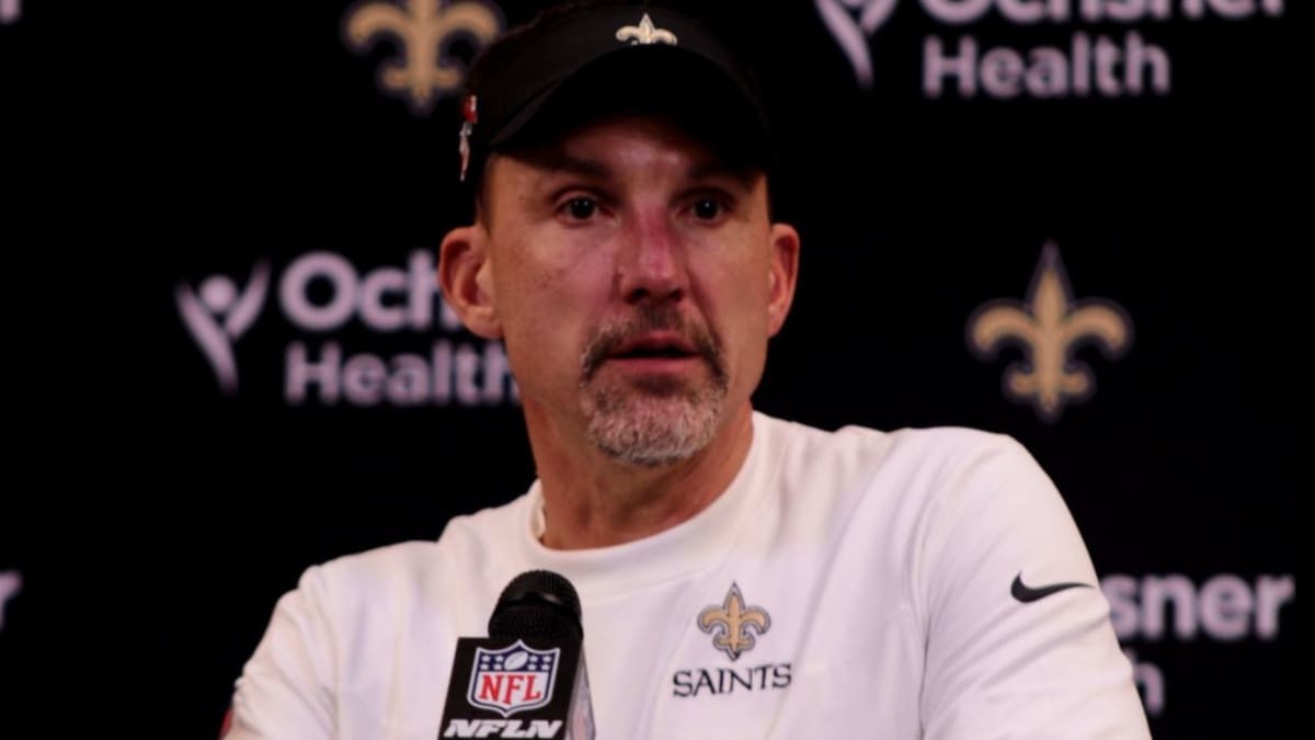 New Orleans, USA. August 13, 2023: New Orleans Saints Head Dennis Allen  encourages his players as they come off the field during NFL pre-season game  action between the New Orleans Saints and