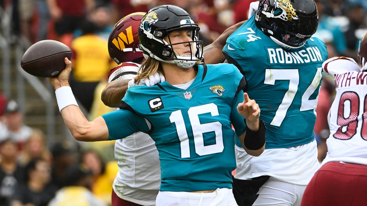 Trevor Lawrence bounces back from early sack, turns in solid debut as  Jacksonville Jaguars quarterback - ESPN