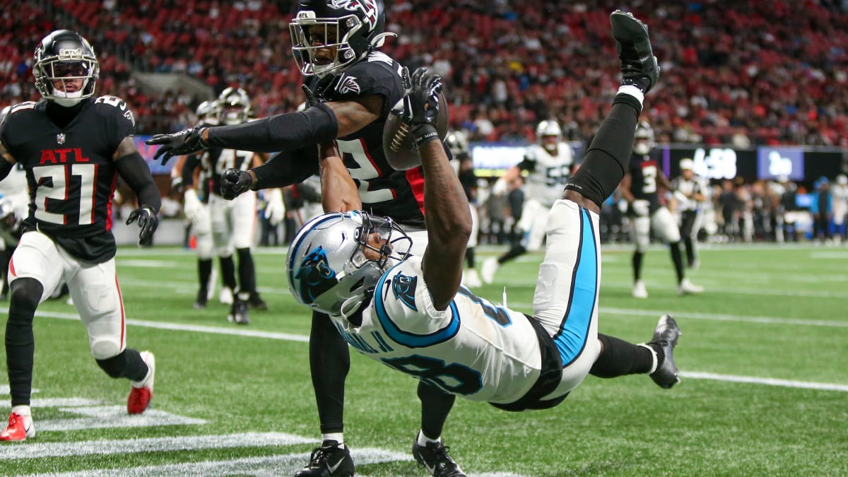 ATLANTA, GA – OCTOBER 30: Atlanta cornerback Isaiah Oliver (26) reacts  after a defensive touchdown during the NFL game between the Carolina  Panthers and the Atlanta Falcons on October 30th, 2022 at