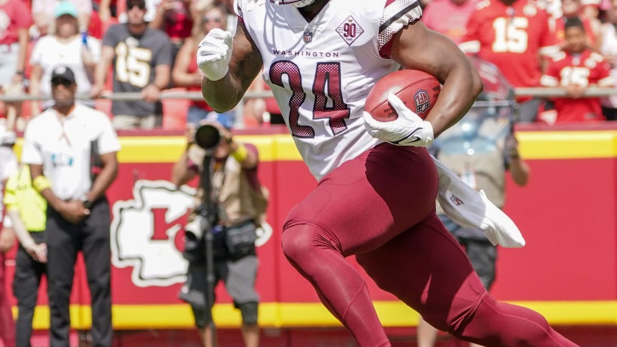 Antonio Gibson Washington Commanders Unsigned Carries The Ball Photograph