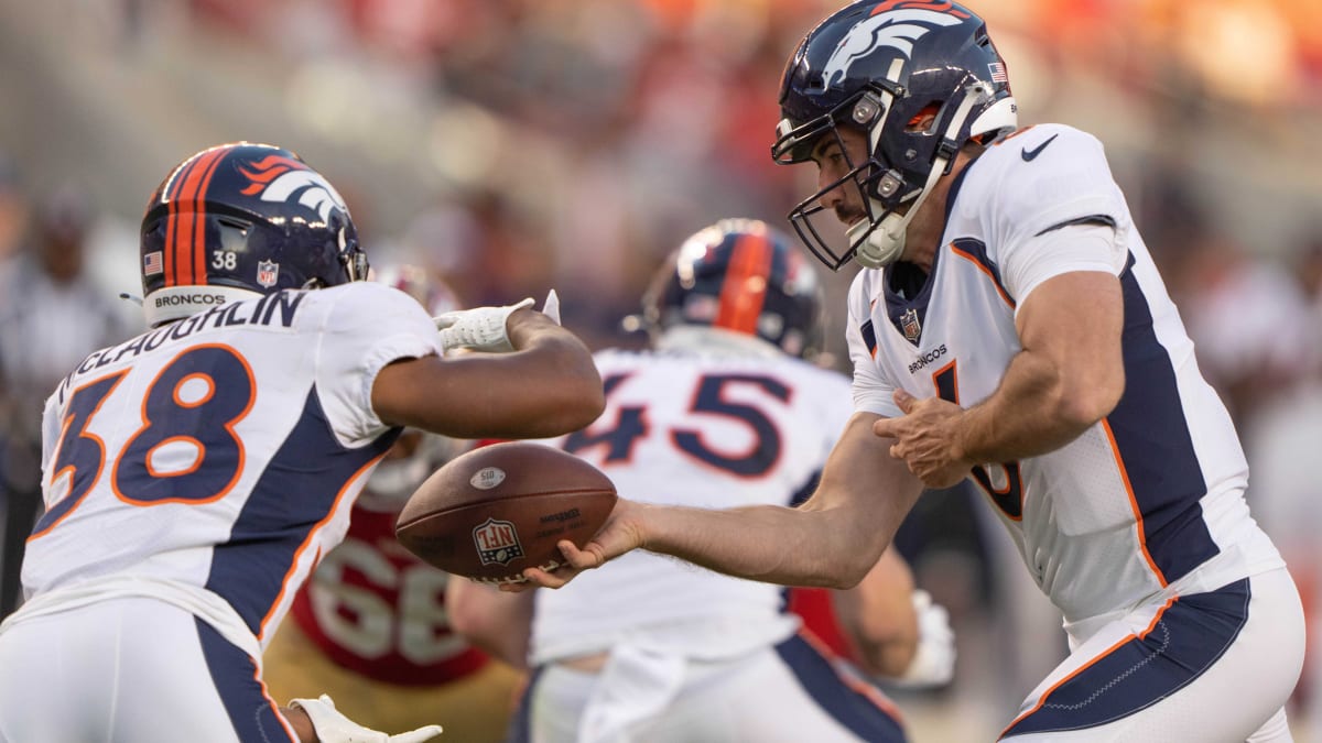 DENVER BRONCOS QUARTERBACK competition in full gear