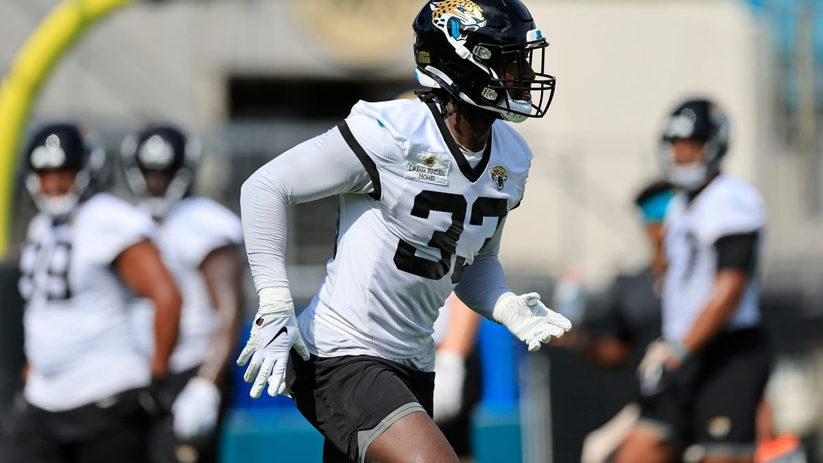 Jacksonville Jaguars linebacker Devin Lloyd (33) enters the field