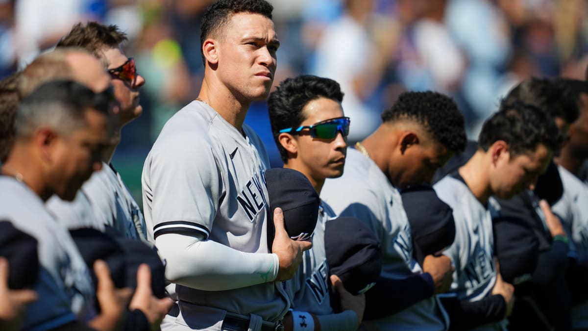 Aaron Judge signs autographs prior to the Yankees game against the
