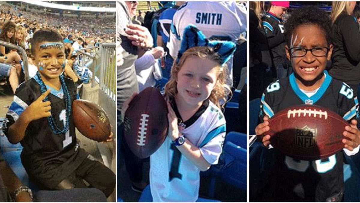 Cam Newton fooled by young Saints fan in Panthers jersey, gives him TD ball