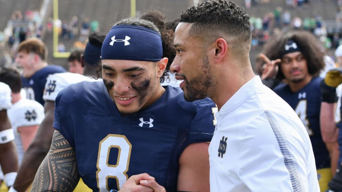 Notre Dame football assistant Chansi Stuckey challenges his receivers