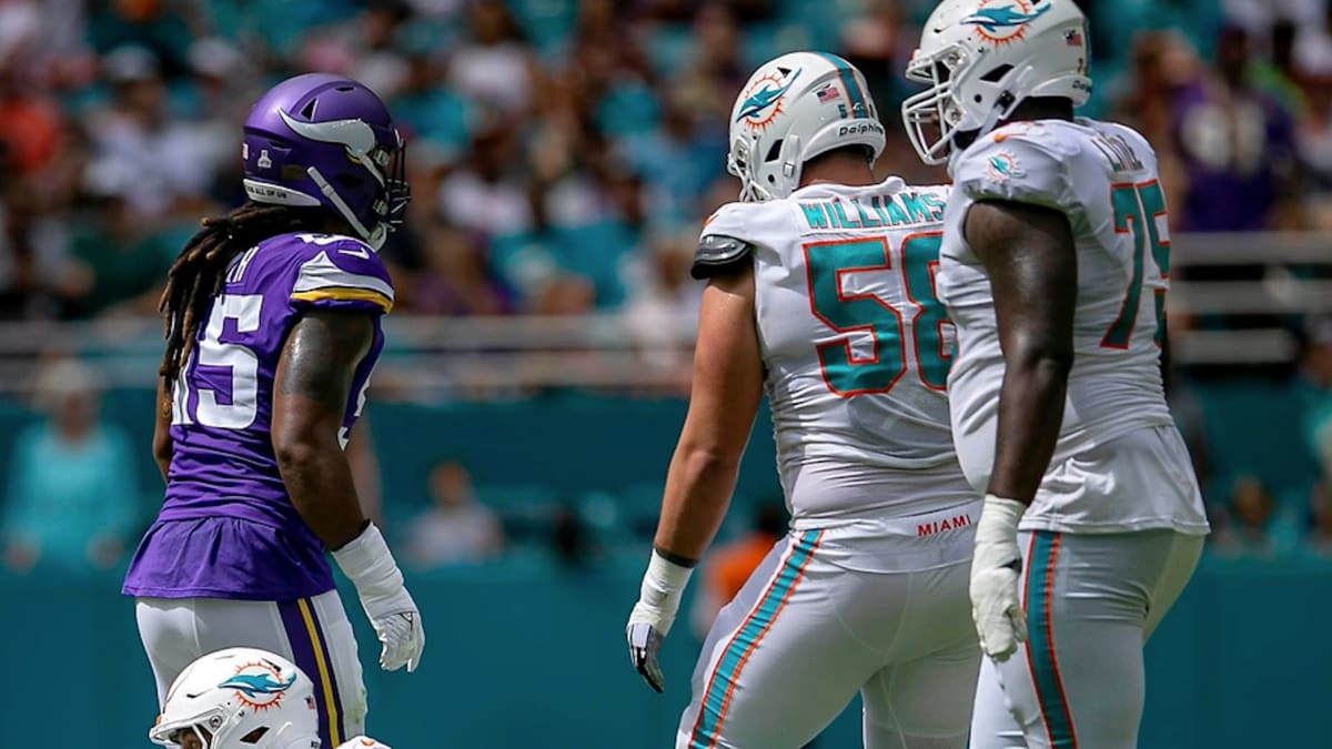 Miami Dolphins offensive tackle Greg Little (75) waits on play