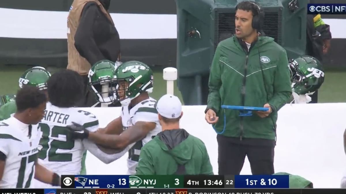 DENVER, CO - OCTOBER 23: New York Jets running back Michael Carter walks on  the sidelines before a NFL game between the New York Jets and the Denver  Broncos on October 23