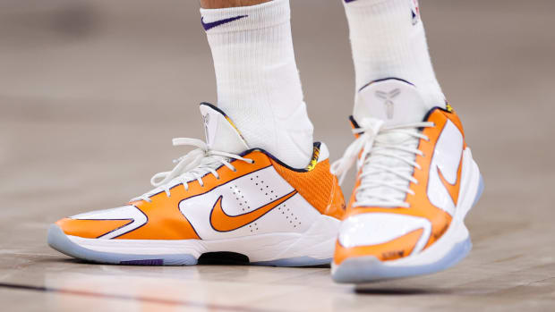 White 2025 orange shoes