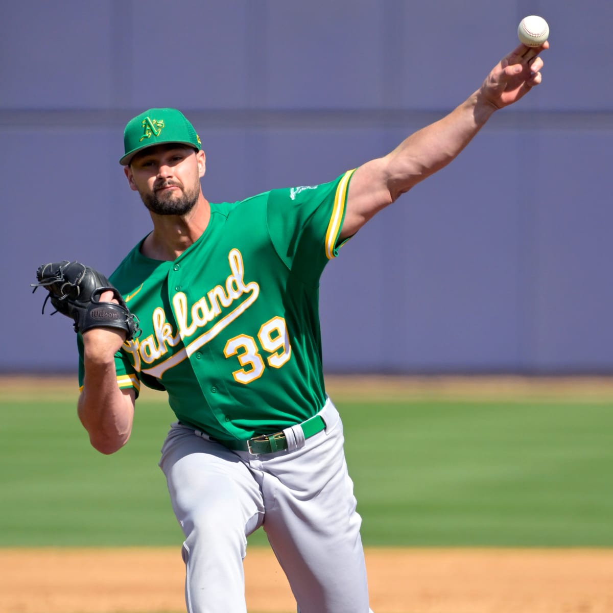 Kyle Muller of the Oakland Athletics heads to the field before the News  Photo - Getty Images