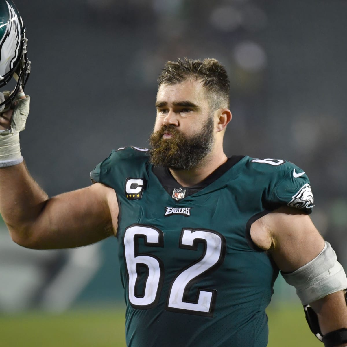 Philadelphia Eagles center Jason Kelce (62) adjusts his gear during  warm-ups prior to the NFL divisional round playoff football game against  the New York Giants, Saturday, Jan. 21, 2023, in Philadelphia. (AP
