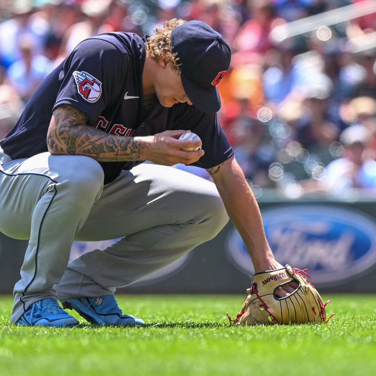 Scottsdale, United States. 25th Mar, 2022. Cleveland Guardians equipment in  the dugout hats and gloves during a MLB spring training baseball game on  Friday Mar. 25, 2022, at Scottsdale Stadium in Scottsdale