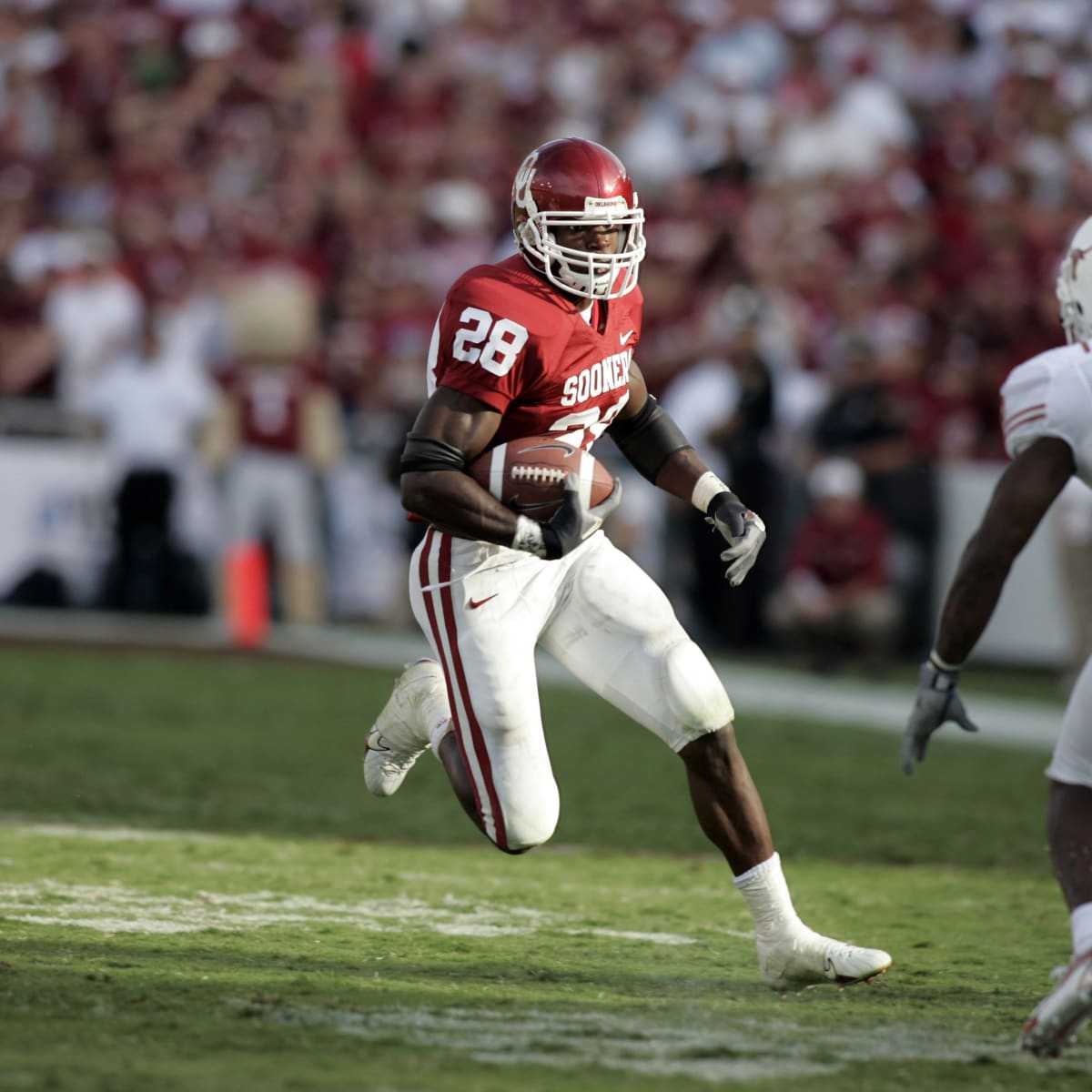 Adrian Peterson Oklahoma Sooners Fanatics Authentic Unsigned Crimson Jersey  Scoring Touchdown vs. Kansas State Photograph