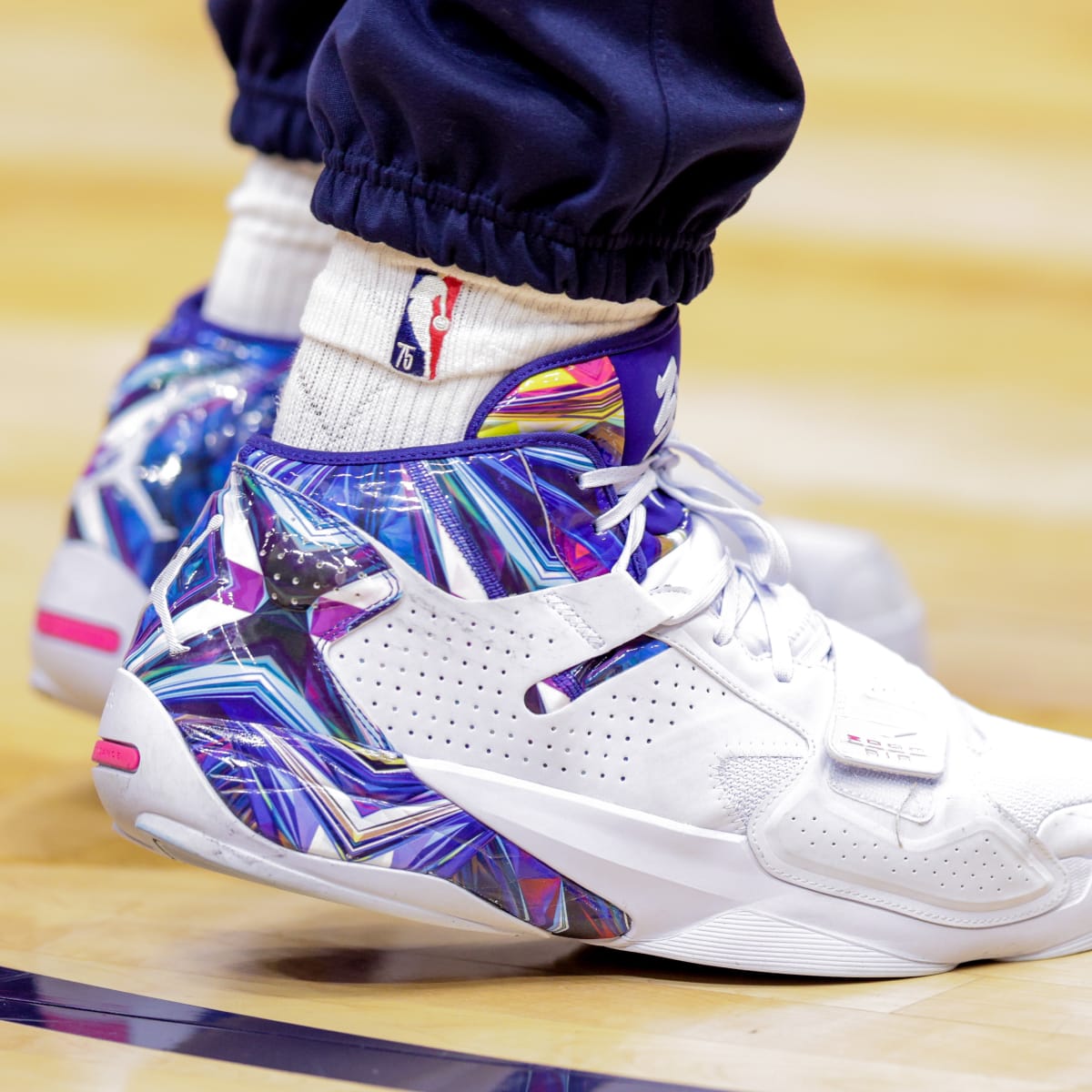 NBA Jordans on Court: Nick Young - Air Jordan 11 Low White/Purple Customs  - Air Jordans, Release Dates & More