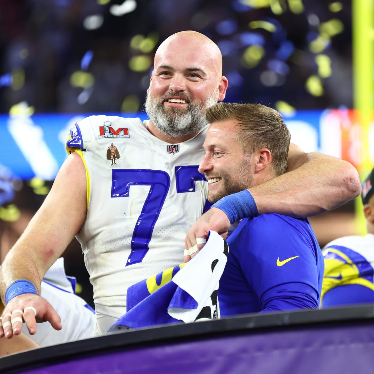 Los Angeles Rams offensive lineman Andrew Whitworth holds up the Vince  Lombardi Super Bowl trophy during the team's victory parade in Los Angeles,  Wednesday, Feb. 16, 2022, following their win Sunday over