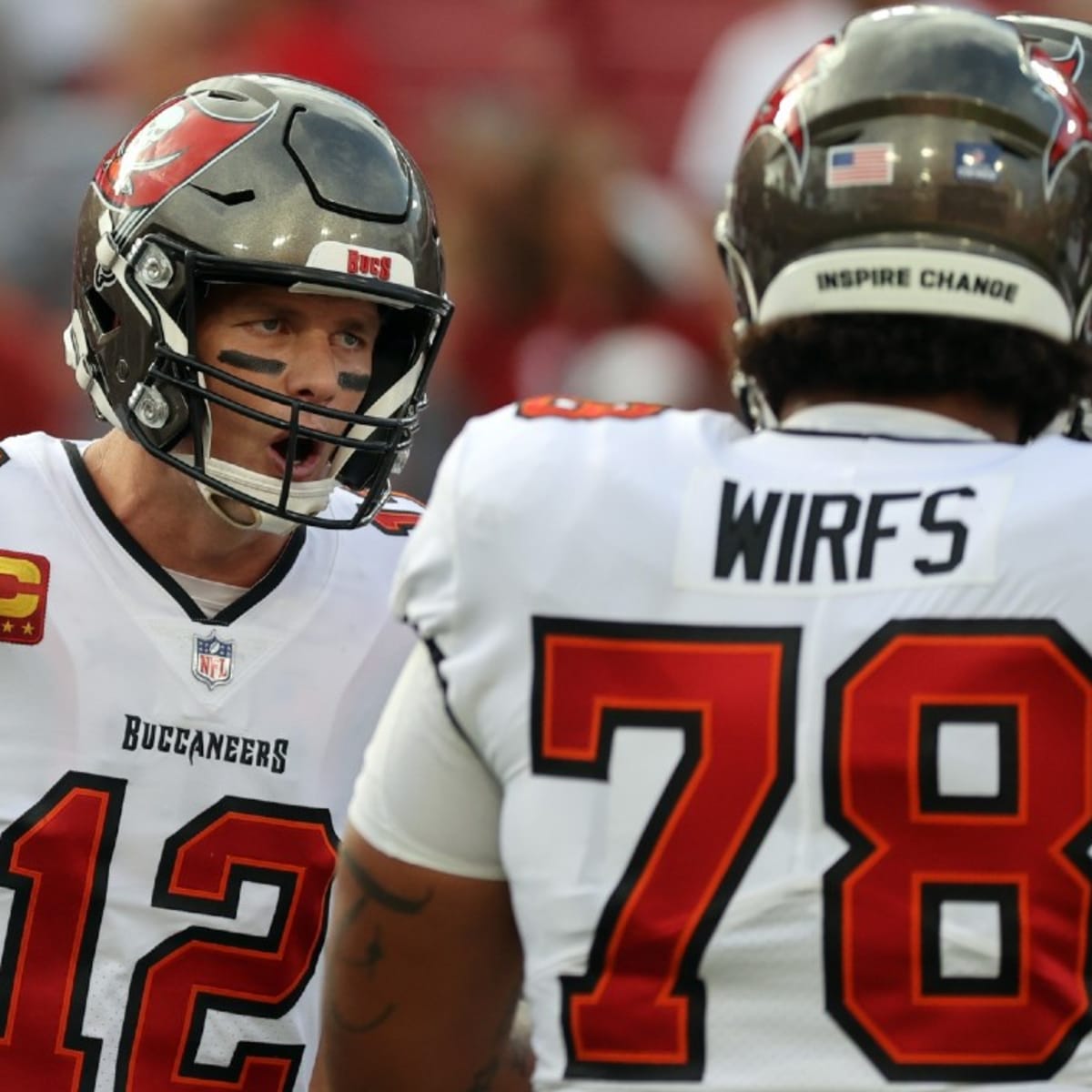 Bucs' playoff romp comes at a cost as Tristan Wirfs exits with ankle injury