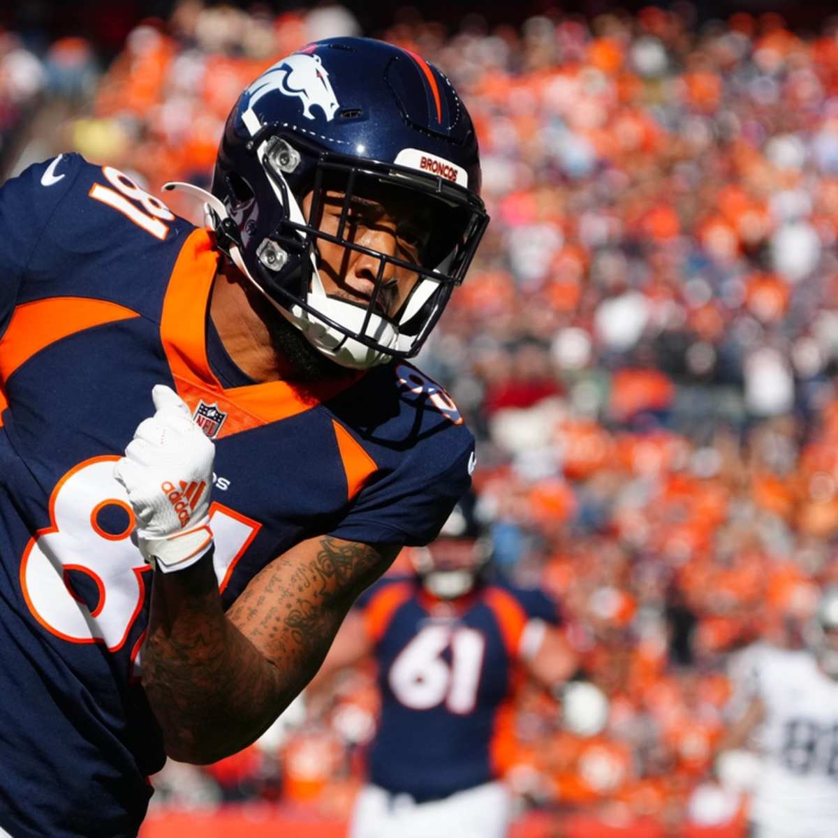 Denver Broncos running back Damarea Crockett (39) is tackled against the  Los Angeles Rams during the