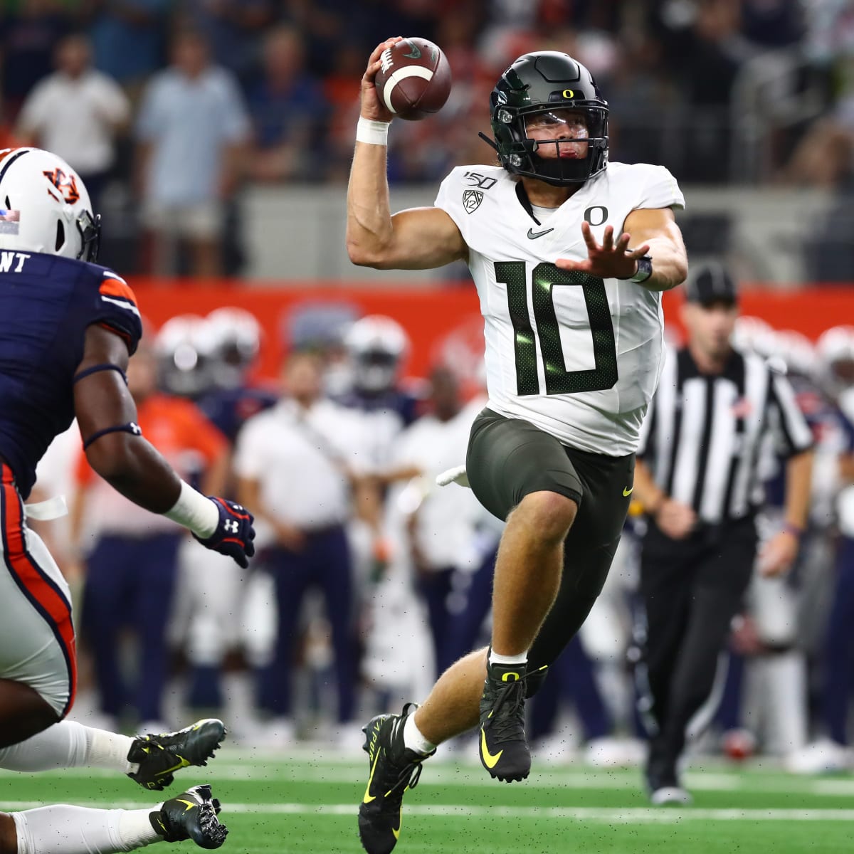 A shirtless Justin Herbert? Oregon Ducks say their QB's come out