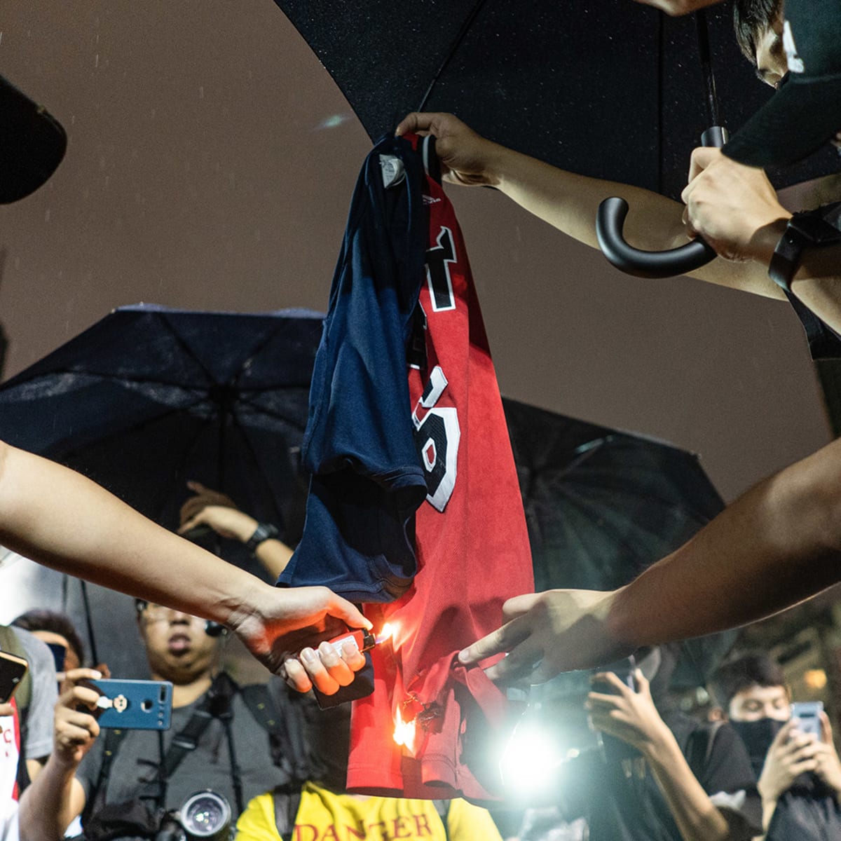 Hong Kong Protesters Crush LeBron James For Comments on China, Burn His  Jersey in the Streets - Sports Illustrated