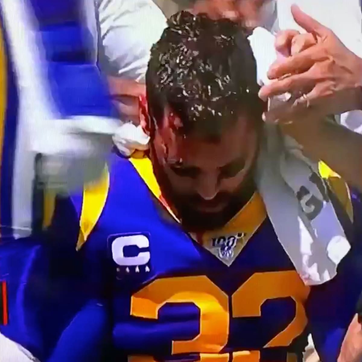 Rams' Eric Weddle bleeds from head after Christian McCaffrey hit him -  Sports Illustrated