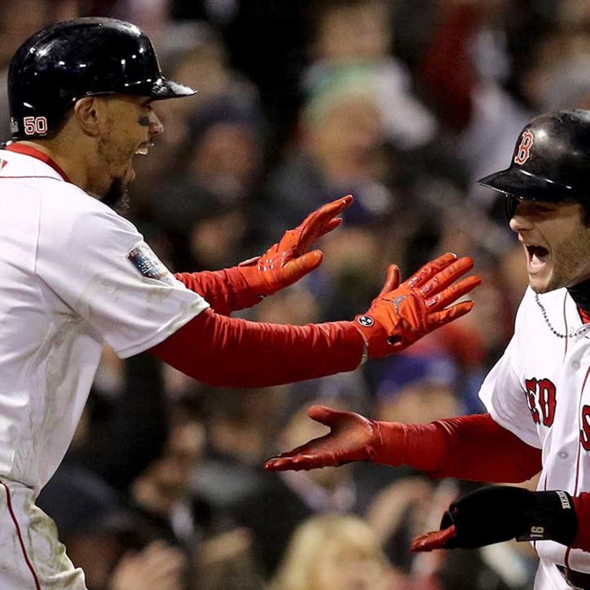 Rafael Devers of the Boston Red Sox spits against the Philadelphia