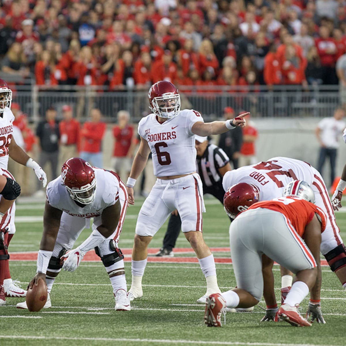 Watch OU QB Baker Mayfield hit a TCU player in the head with throw