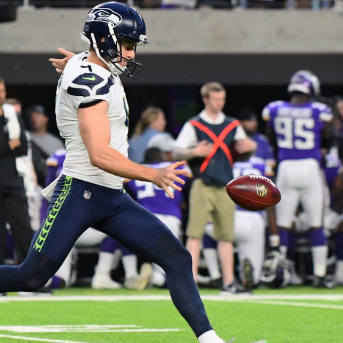 Seattle Seahawks punter Michael Dickson kicks a ball before the