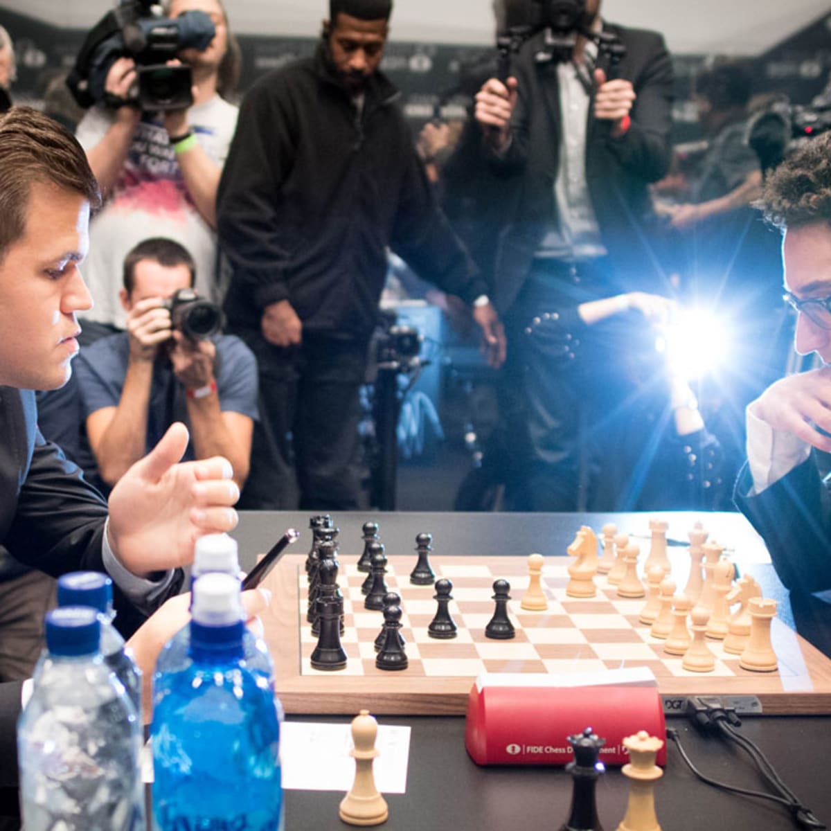 World chess championship: Carlsen defeats Caruana
