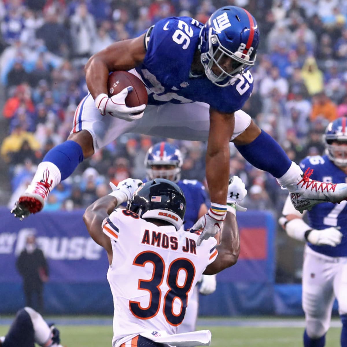 : New York Giants Saquon Barkley Jumps over Chicago