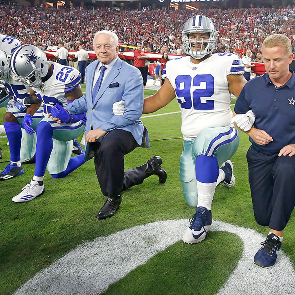 NFL players lock arms in national anthem at Cowboys-Cardinals game