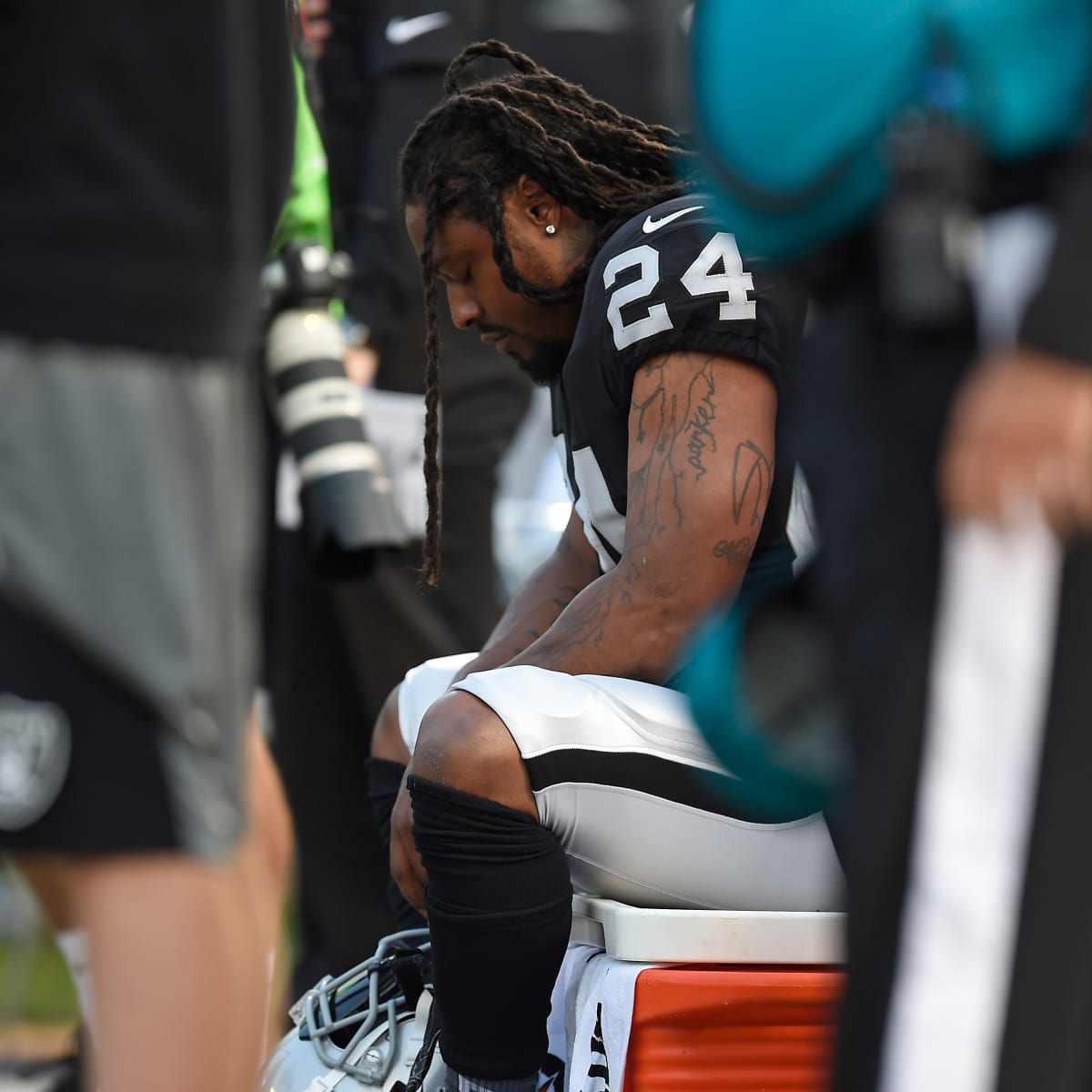 Marshawn Lynch sits in stands after ejection, takes train home after  Oakland Raiders win 