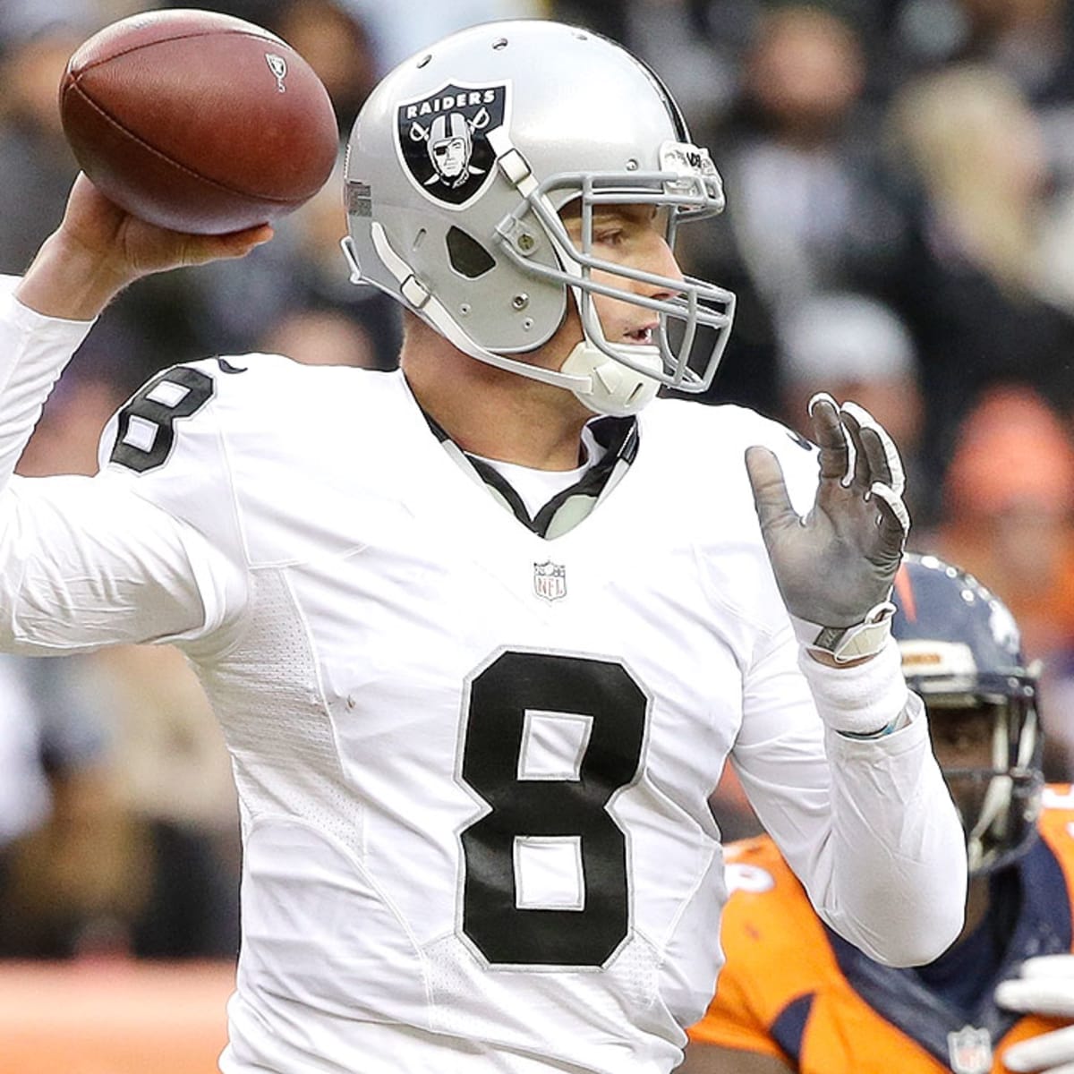 In this Sunday, Jan. 1, 2017, photo, Oakland Raiders quarterback Connor  Cook passes against the Denver Broncos in the first half of an NFL football  game in Denver. The Raiders are going