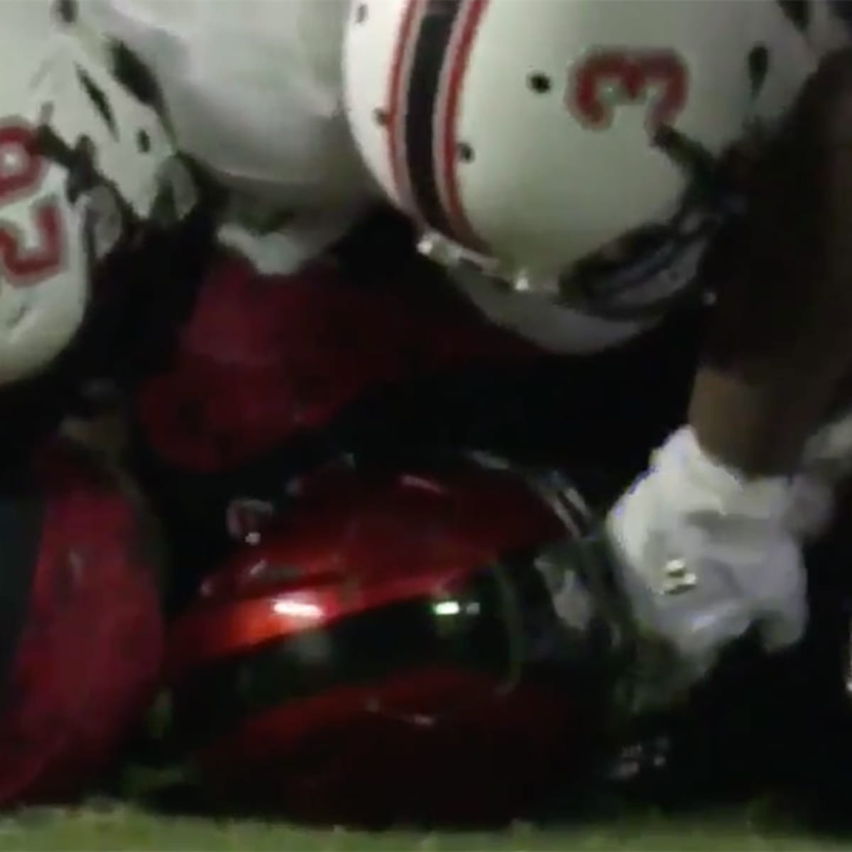 Rashaad Penny poked in eyes by Northern Illinois LB in dogpile
