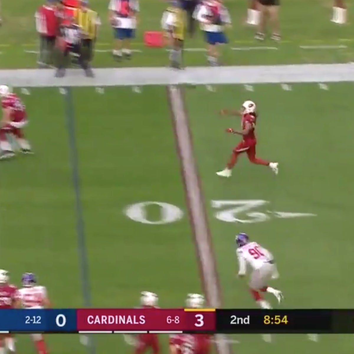 Larry Fitzgerald throws a touchdown pass in training camp practice