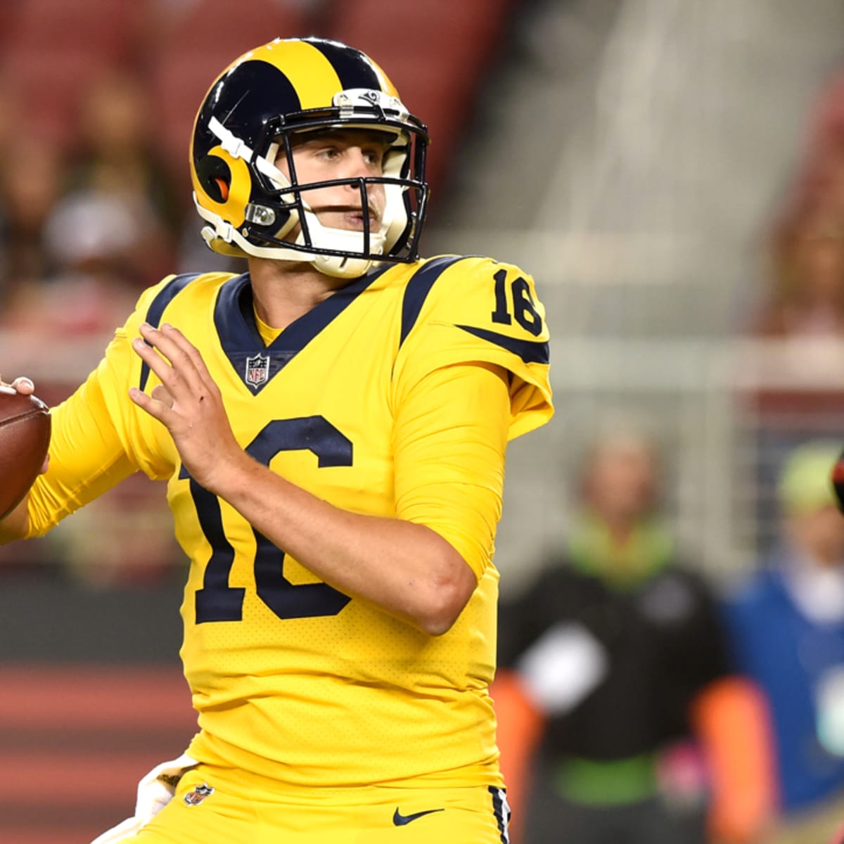 Los Angeles Rams quarterback Jared Goff (16) off balance after being hit  while passing the ball during an NFL football game against the San  Francisco 49ers, Sunday, October 13, 2019 in Los