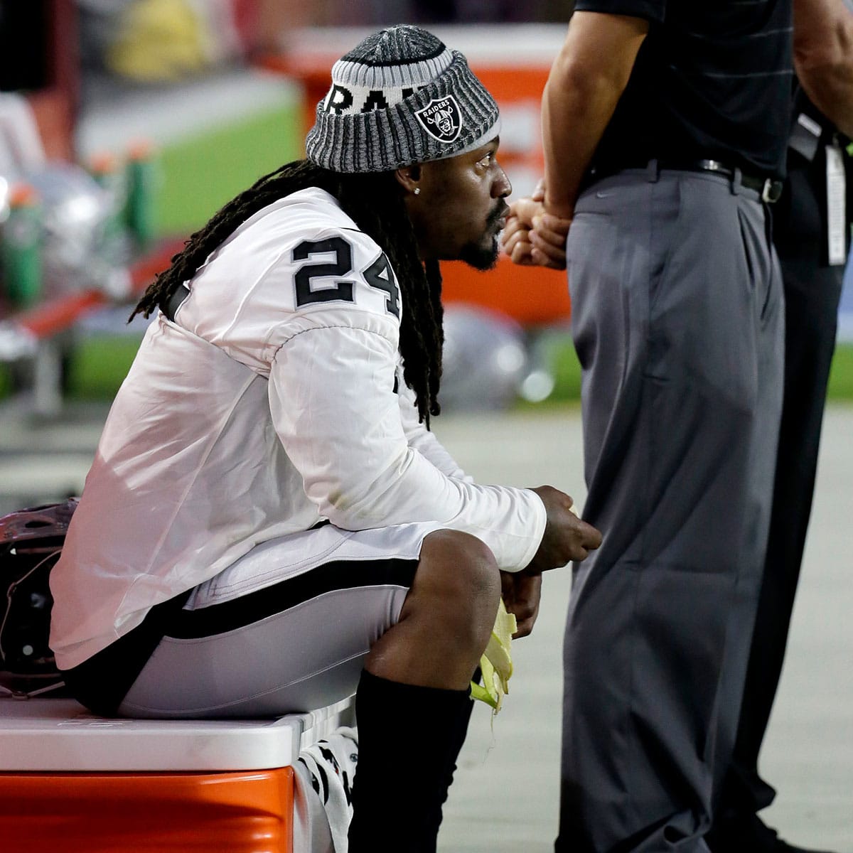 Raiders Marshawn Lynch sits during anthem before Oakland-Arizona game