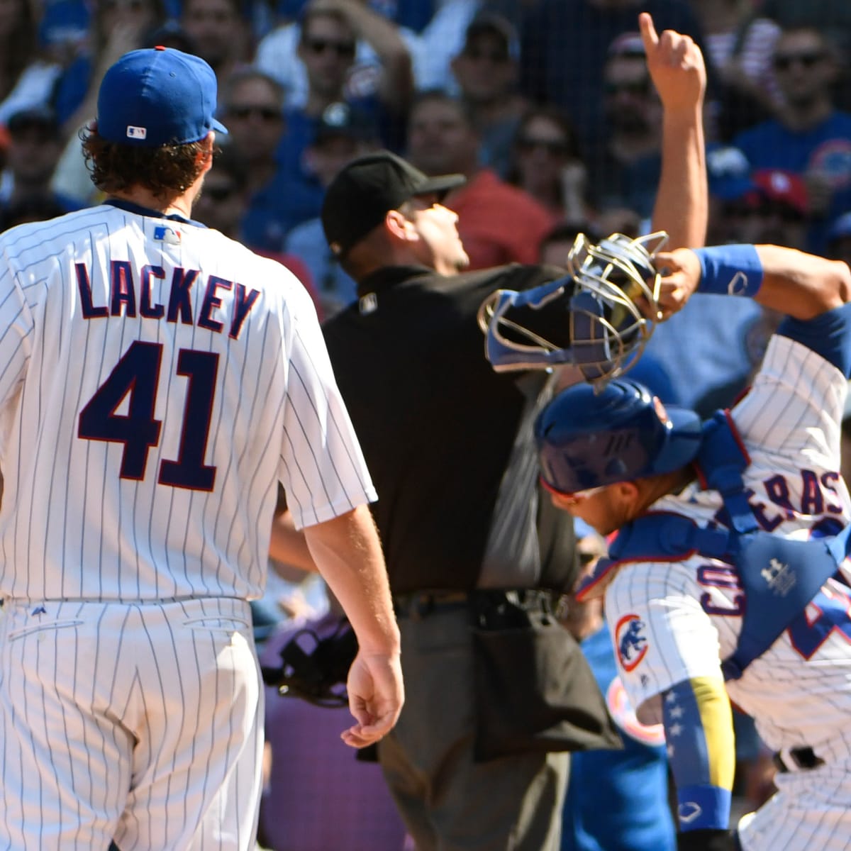 Willson Contreras suspended two games, John Lackey fined for run-in with ump