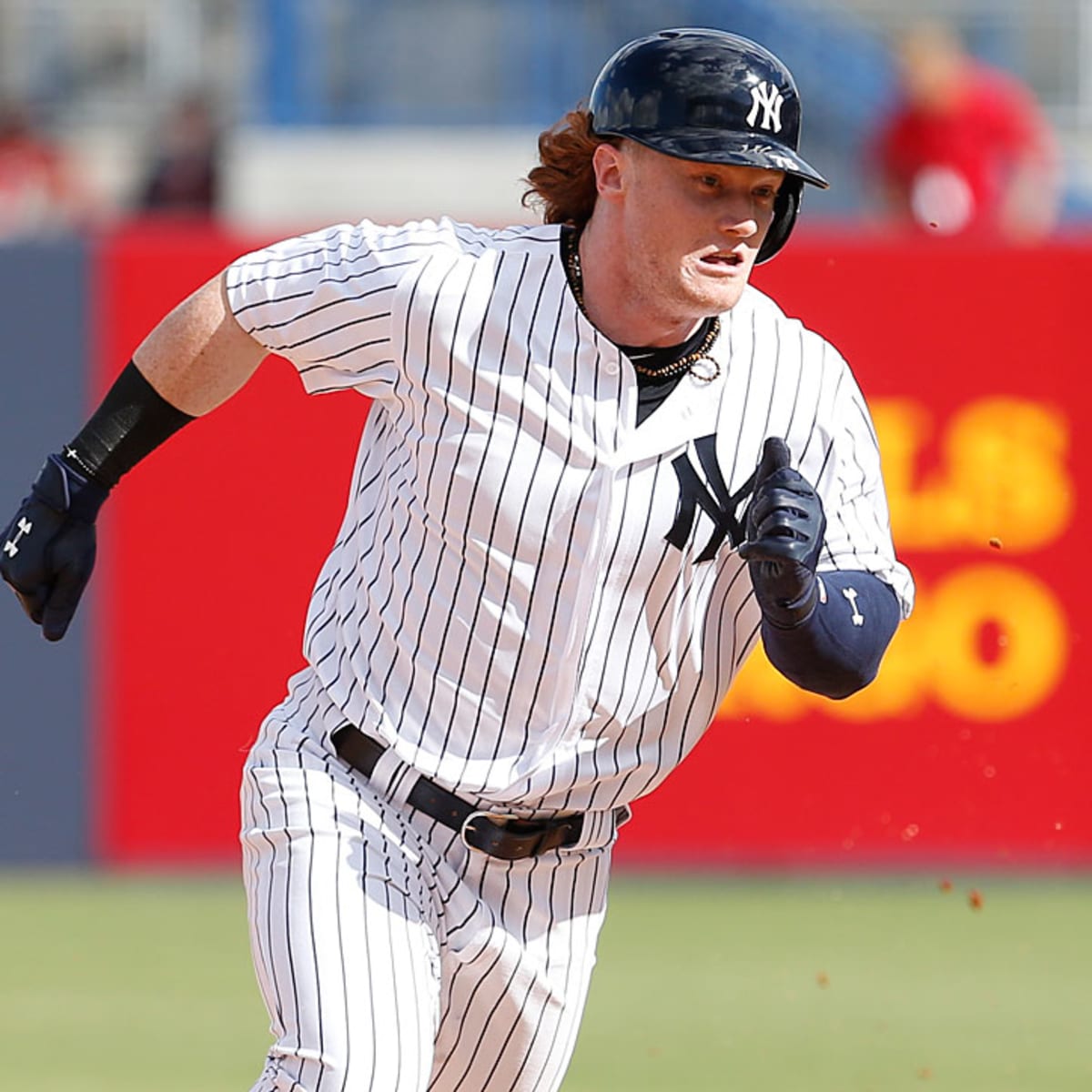 CLEARWATER, FL - MARCH 10: Clint Frazier (75) of the Yankees showing his  freshly cut hair hustles off the field between innings during the spring  training game between the Toronto Blue Jays