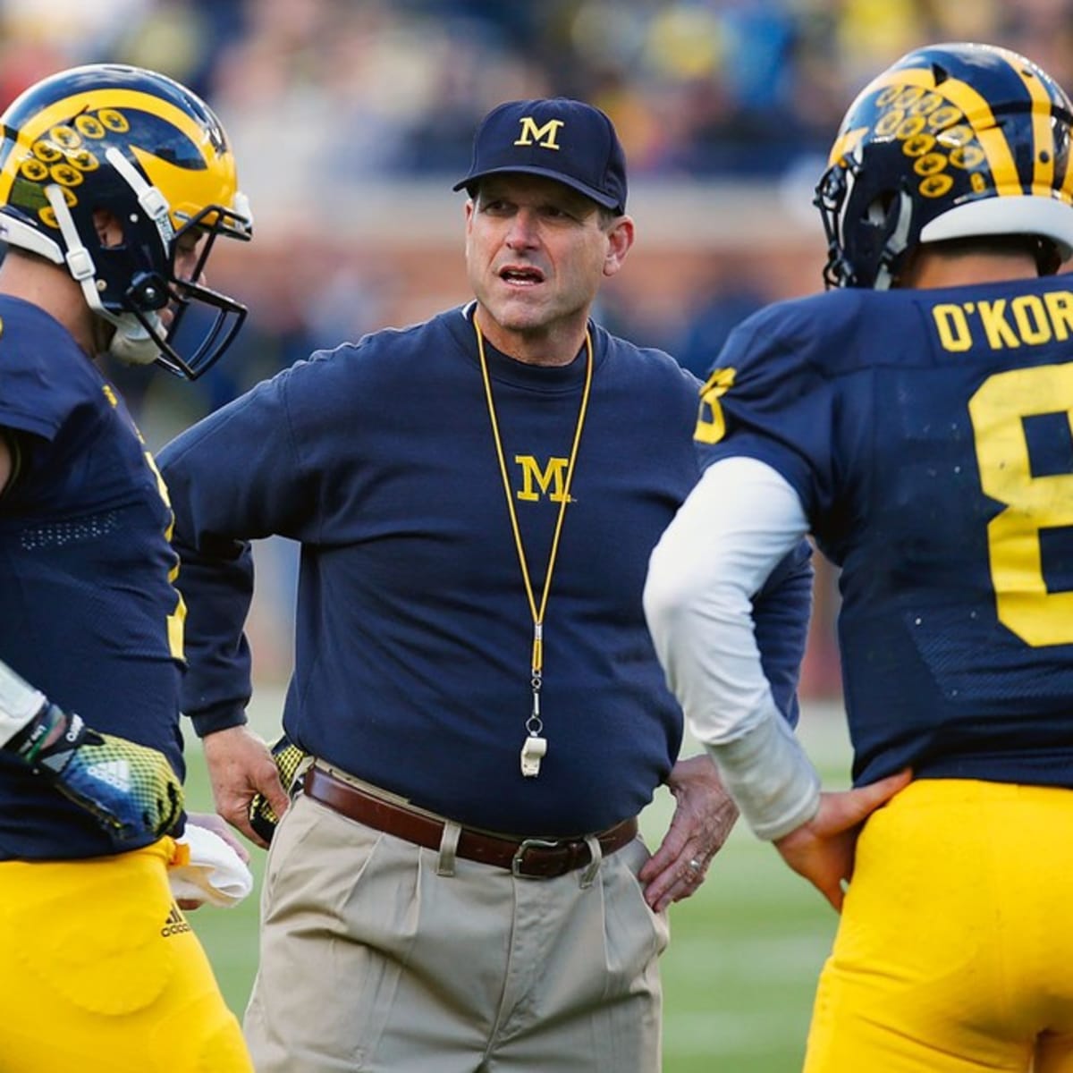 Michigan football dodges disaster by keeping Jim Harbaugh; the