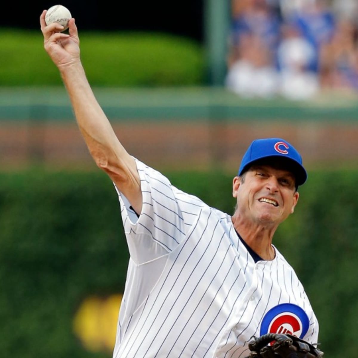 Harbaugh throws ceremonial first pitch