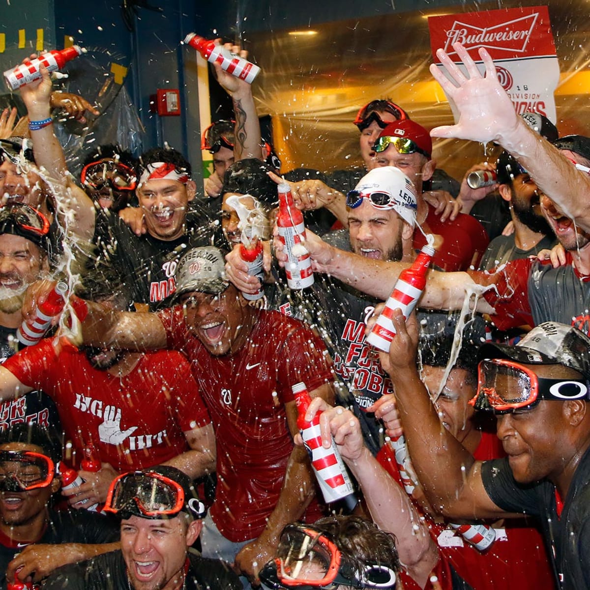 Watch the Washington Nationals pop champagne in the clubhouse