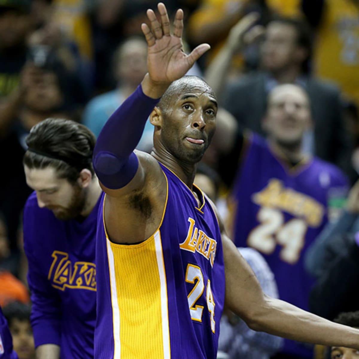 Los Angeles Lakers' Kobe Bryant (8) lays the ball in over San